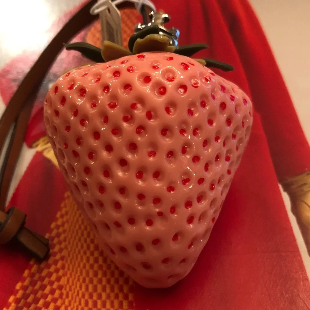 Authentic New with tag. Tory Burch Pink Strawberry bag charm.